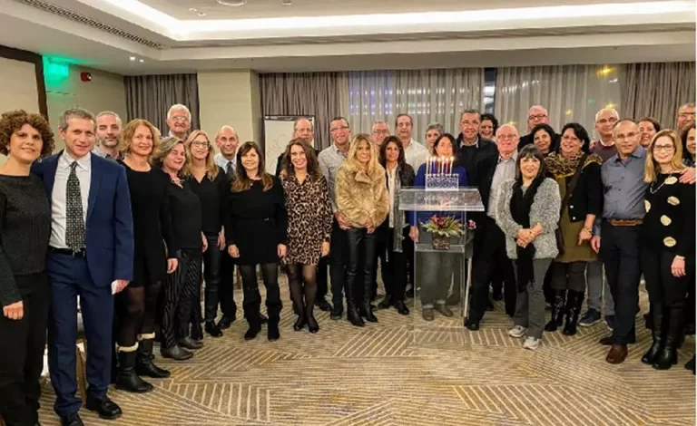 alliott-group-israel-lighting-hanukkah-candles